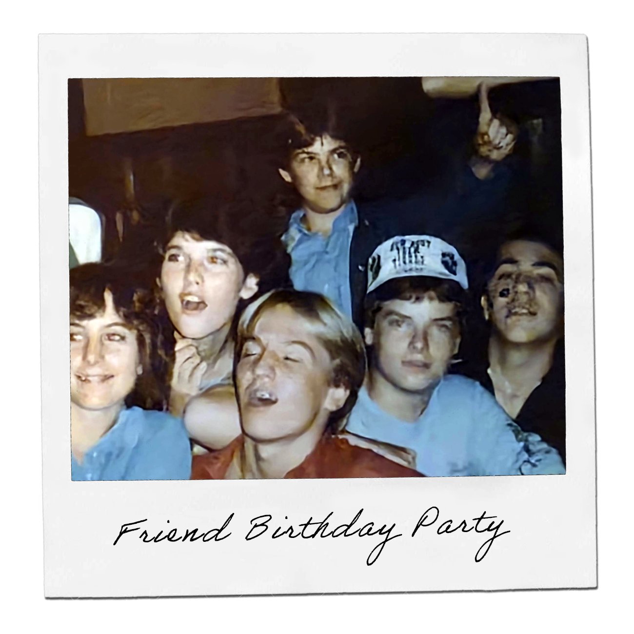 Vintage polaroid: friends crowded together at a birthday party