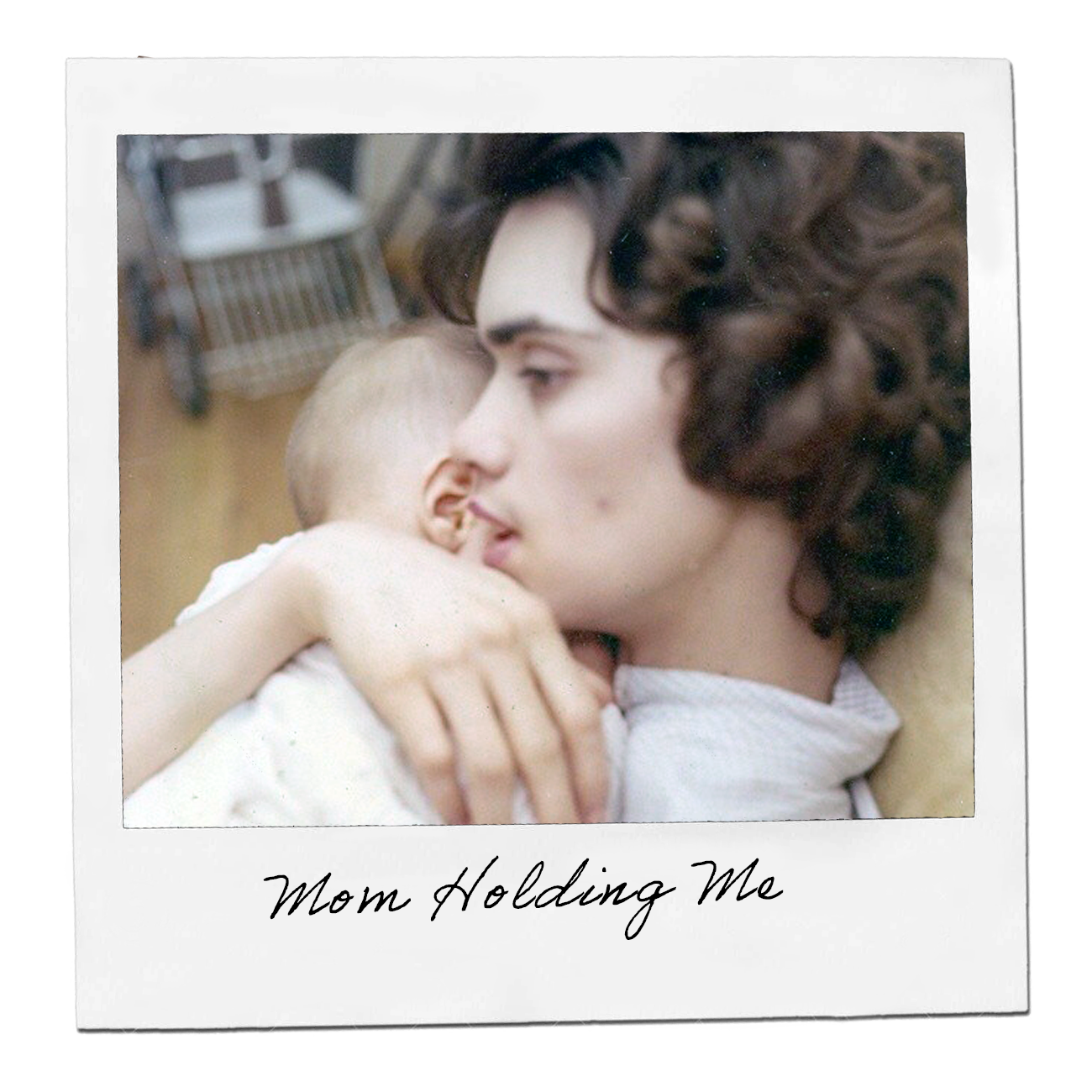 Polaroid: Mom holding the author as a baby